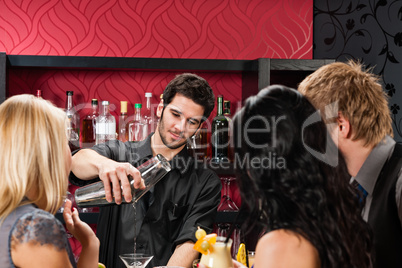 Barman prepare cocktail friends drinking at bar