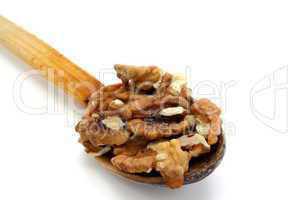 wooden spoon with walnuts
