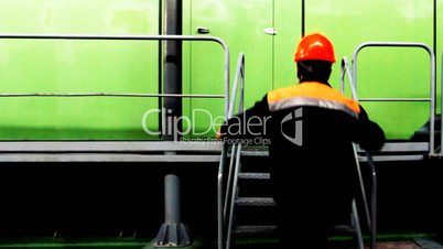 Worker Lowered Down From Platform