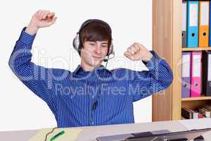 Young Businessman in office with a relaxed music