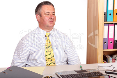 Man in office with shoulder pain