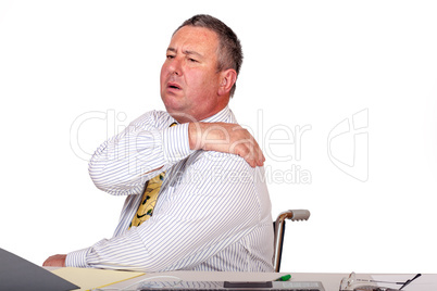 Man in office with shoulder pain