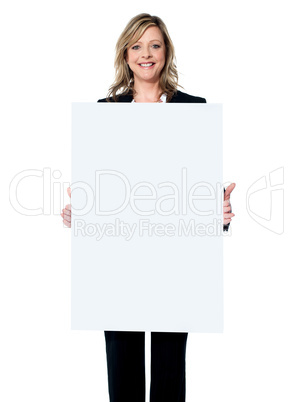 Business woman showing blank signboard