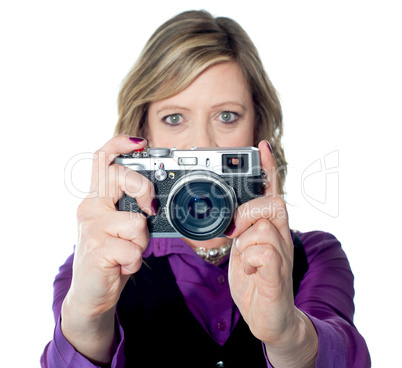 Portrait of a beautiful woman with camera