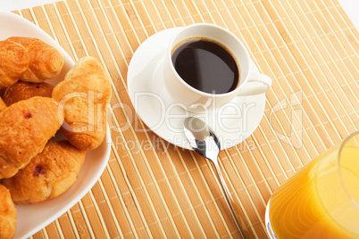 Breakfast coffee and croissants