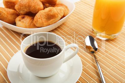 Breakfast coffee and croissants