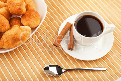 Breakfast coffee and croissants