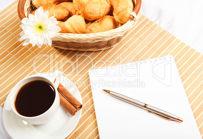 Breakfast coffee and croissants