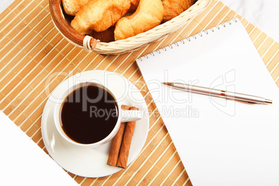 Breakfast coffee and croissants