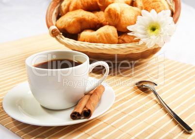 Breakfast coffee and croissants