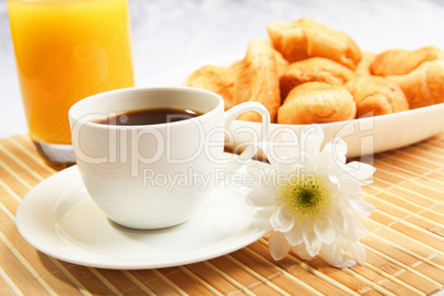 Breakfast coffee and croissants