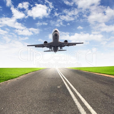 Airplane in blue cloudy sky