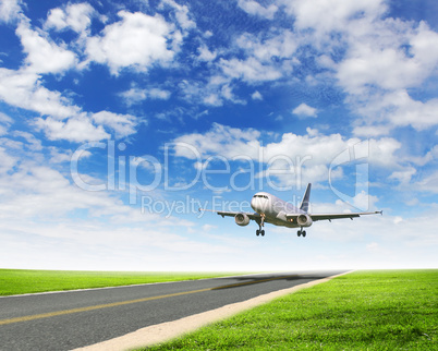 Airplane in blue cloudy sky