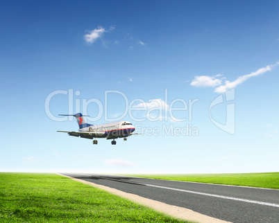 Airplane in blue cloudy sky