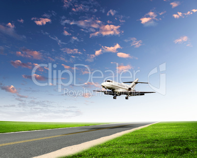 Airplane in blue cloudy sky