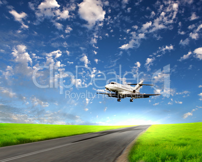 Airplane in blue cloudy sky