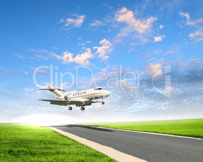 Airplane in blue cloudy sky