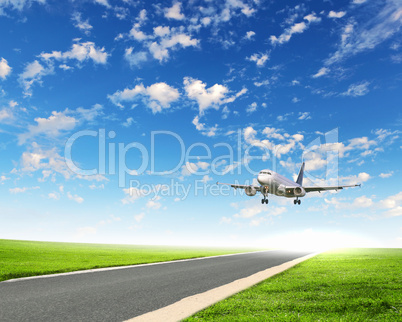 Airplane in blue cloudy sky