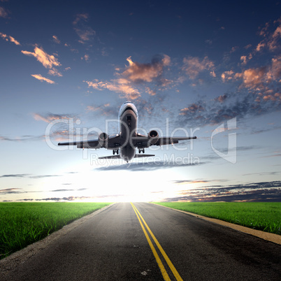 Airplane in blue cloudy sky