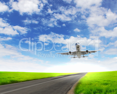 Airplane in blue cloudy sky