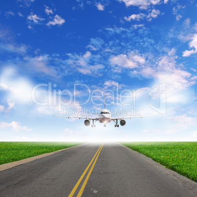 Airplane in blue cloudy sky