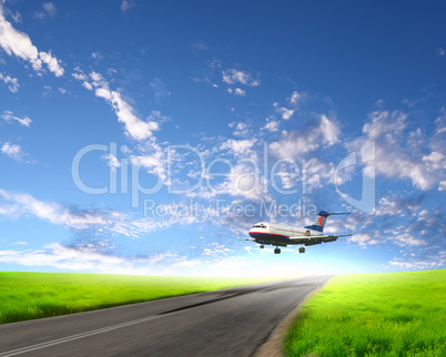 Airplane in blue cloudy sky