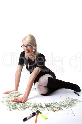 Young blond business woman count money