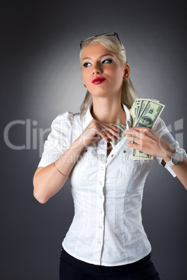 young blond woman hide money under shirt