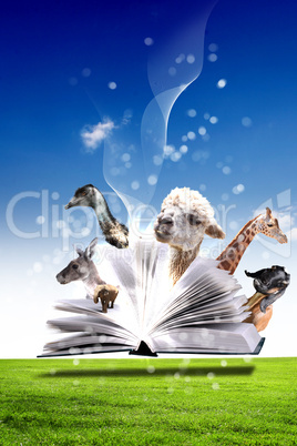 Open book with green nature world