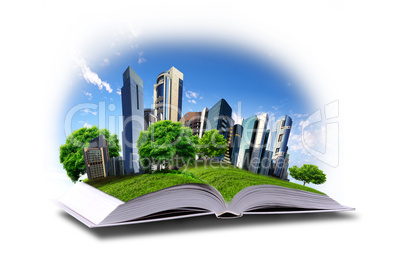 Open book with green nature world