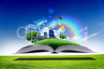 Open book with green nature world