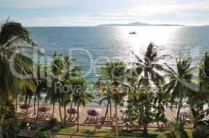 Beach with palm trees of luxury hotel, Pattaya, Thailand