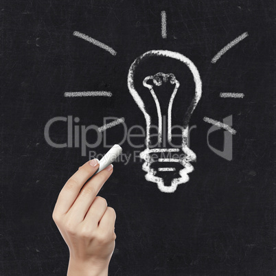 School blackboard and light bulb symbol