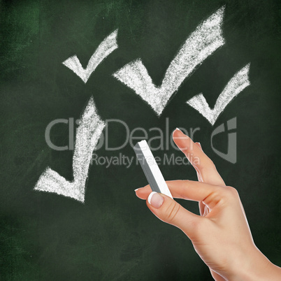 School blackboard and checkmark symbol