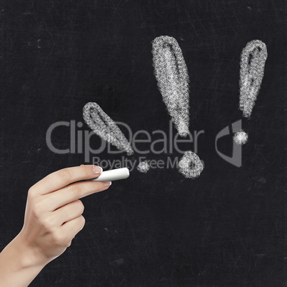 School blackboard and exclamation symbol