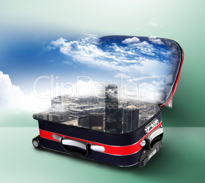 Red suitcase with city inside