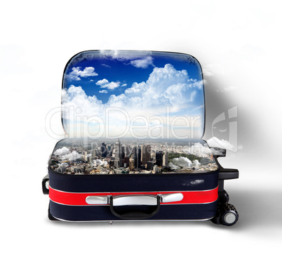Red suitcase with city inside