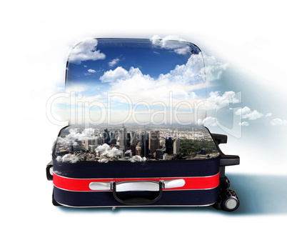 Red suitcase with city inside