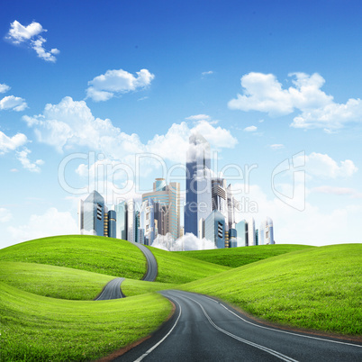 Modern city surrounded by nature landscape