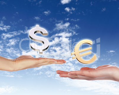 Human hands holding money against blue sky