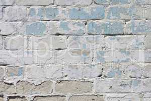 white textured brick wall painted