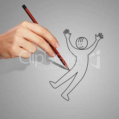 Human hand drawing a man