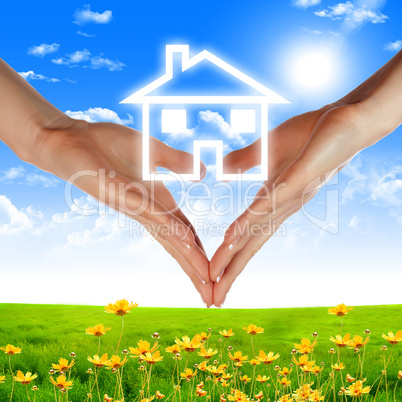 hands holding house hands holding house