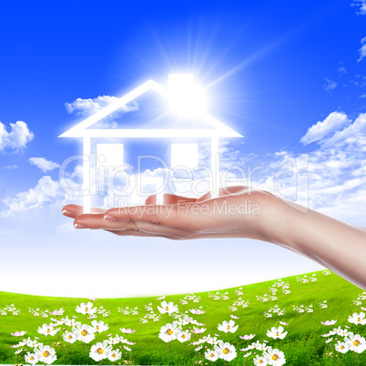 hands holding house hands holding house