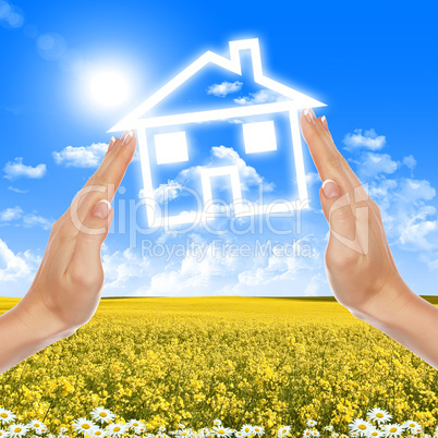 hands holding house hands holding house