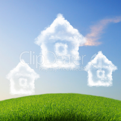 House from white clouds against blue sky
