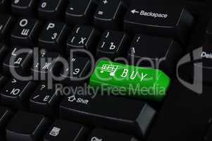 Computer keyboard with on-line shopping symbol