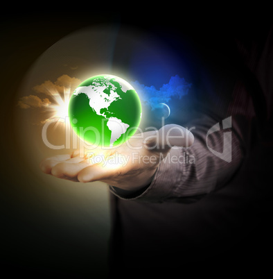 Human hand holding earth