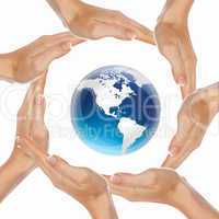 human hand and symbol of our planet