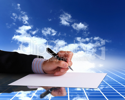 Businessman hand signing documents